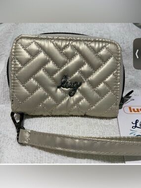 Lug Chipper Wristlet Wallet in Metallic Champagne.